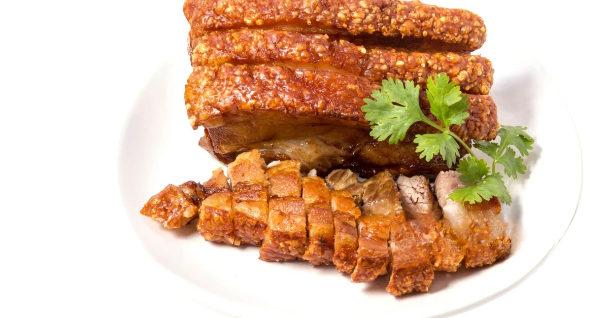 Fresh crispy pork belly before cutting at Vavelle kitchen